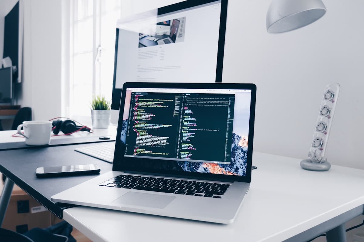 Live code on a developer's screen at Molveau Studio